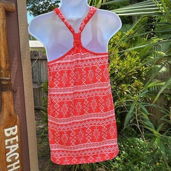 Poof A fun orange and white top. Straps come together and back in a Y shape. - Picture 5 of 11